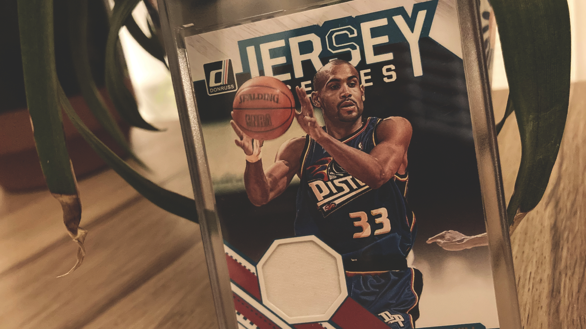Trading Card mit Trikotstück von Grant Hill